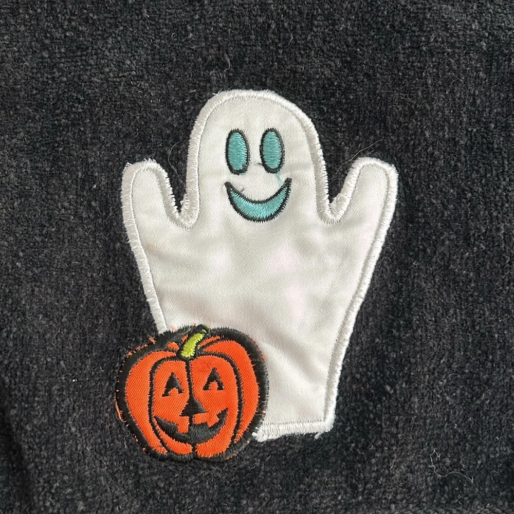 Halloween hand towels with a friendly ghost and pumpkin appliqué